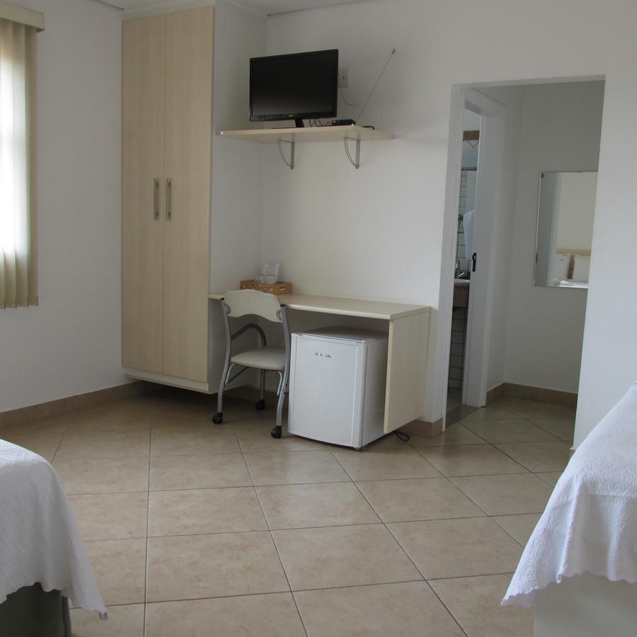 Holambra Garden Hotel Esterno foto A typical room at the hostel